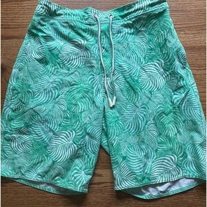 Johnnie-O swim shorts- green leaf design- size men’s large elastic in back.